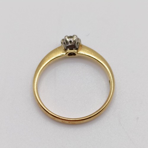 786 - An 18ct gold and diamond solitaire ring, ring size M