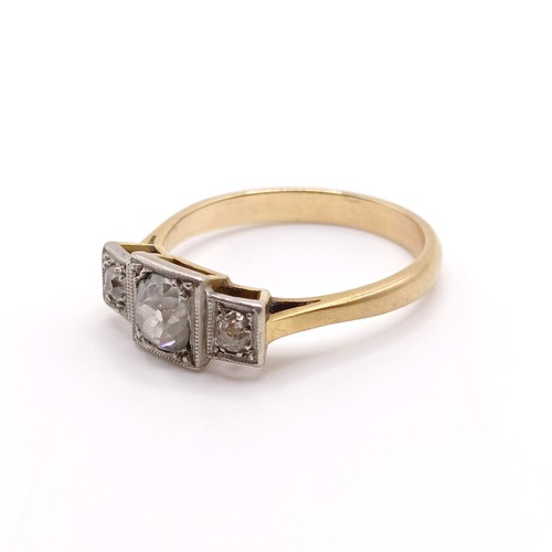 840 - An Art Deco diamond three stone ring, ring size O