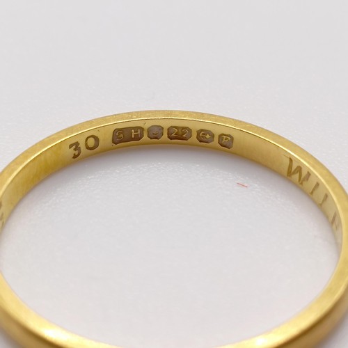 771 - A 22ct gold wedding band, 1.9 g, and a keeper type ring (2)