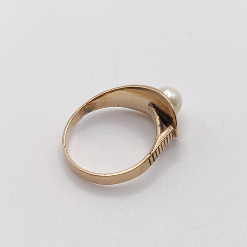 758 - A 14ct gold and pearl ring, ring size N, 3.6 g all in,