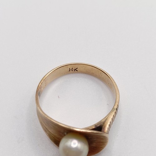 758 - A 14ct gold and pearl ring, ring size N, 3.6 g all in,