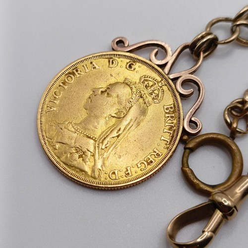 743 - A Victorian double sovereign, 1887, on a 9ct gold chain, all in 51.7 g