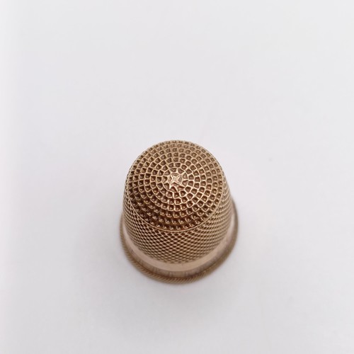 730 - A 9ct gold thimble, 3 g