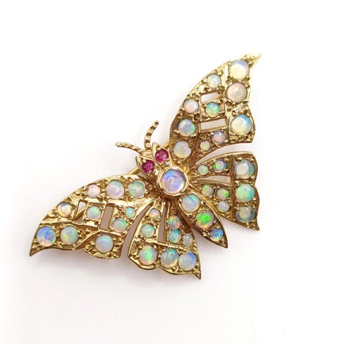 714 - A 9ct gold and opal butterfly brooch