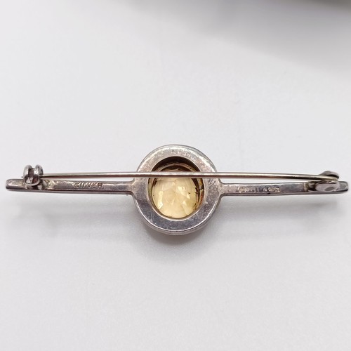 687 - A silver, yellow and white stone bar brooch, in a vintage jewellery box