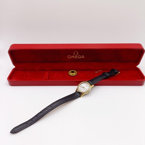 1014 - A ladies Omega wristwatch, on a leather strap