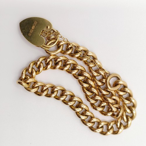 947 - An 18ct gold link bracelet, with a padlock clasp, 32.0 g