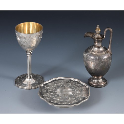 1379 - A Victorian silver communion set, comprising a cup, tray and a salver, London 1883