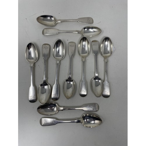 1259 - A set of eleven silver fiddle pattern teaspoons, initialed, London 1839, 11.2 ozt