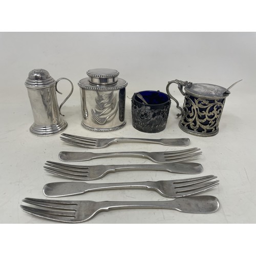 1386 - A silver coloured metal kitchen pepper, a silver plated caddy, a silver mounted mustard pot, salt, a... 