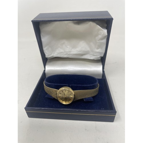 1033 - A ladies 9ct gold Rotary wristwatch, boxed