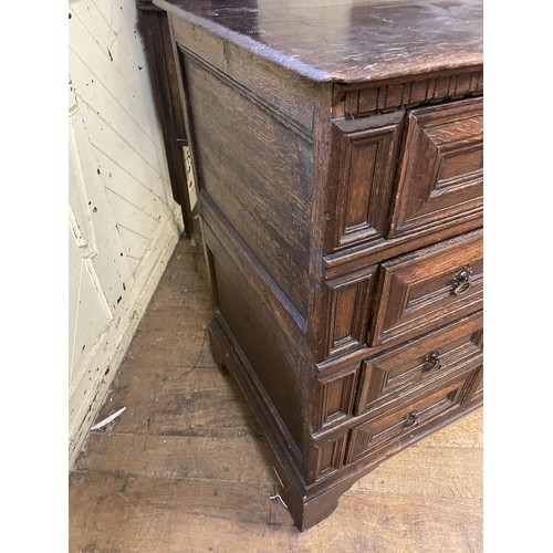 1597 - An 18th/19th century oak chest, having four drawers, 95 cm wide