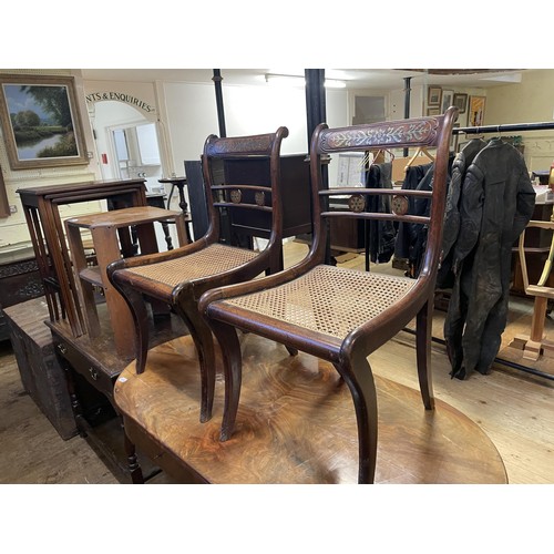 1606 - A 19th century Continental mahogany table, having two drawers, 130 cm, and three dining chairs (4)