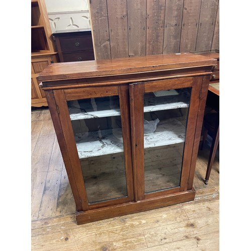 1631 - A mahogany glazed bookcase, 87 cm wide, and another (2)