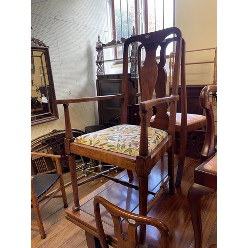 1624 - A mahogany extending draw leaf dining table, the top 153 x 122 cm, a set of seven Queen Anne style d... 