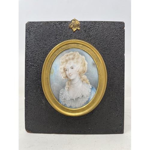 1506 - ***Withdrawn*** A portrait miniature, of a young lady in a blue dress, oil on board, 12 x 9 cm, in a... 