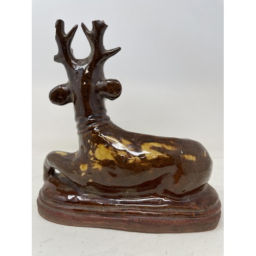 1508 - A slipware stag, 20 cm wide