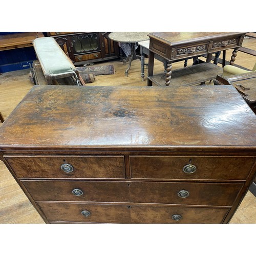 1709 - A 19th century oak chest, having two short and three long pollard oak drawers, 115 cm wide