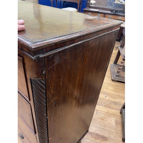 1709 - A 19th century oak chest, having two short and three long pollard oak drawers, 115 cm wide