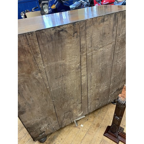 1709 - A 19th century oak chest, having two short and three long pollard oak drawers, 115 cm wide