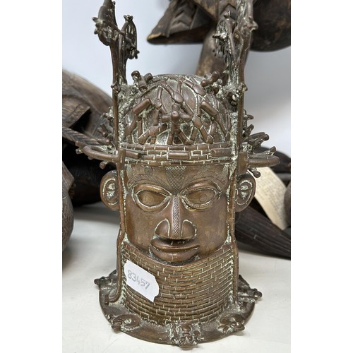 1451 - An African carving of a Cloco, 56 cm high, and five pieces of African art (6)