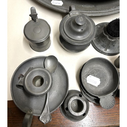 1452 - A pewter charger, 46 cm diameter, and assorted other pewter (qty)