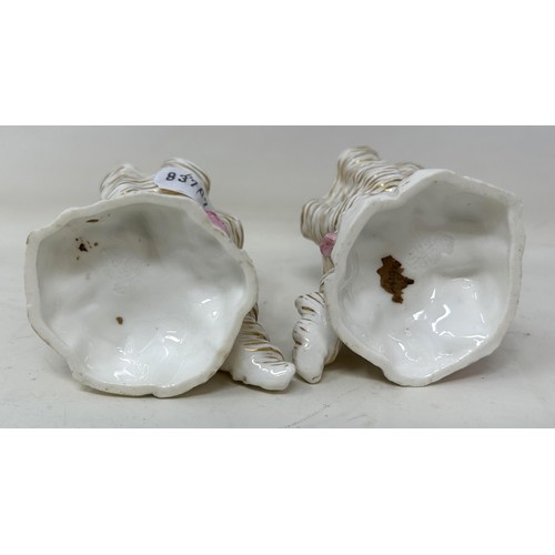 1461 - A pair of Royal Worcester vases, in the form of shells, 9 cm high