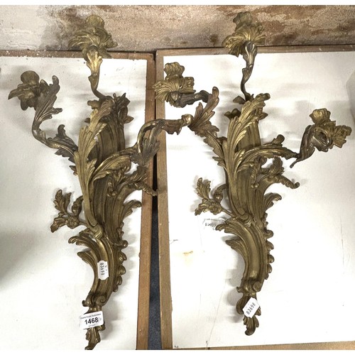 1468 - A pair of gilt metal rococo wall sconces, 54 cm high