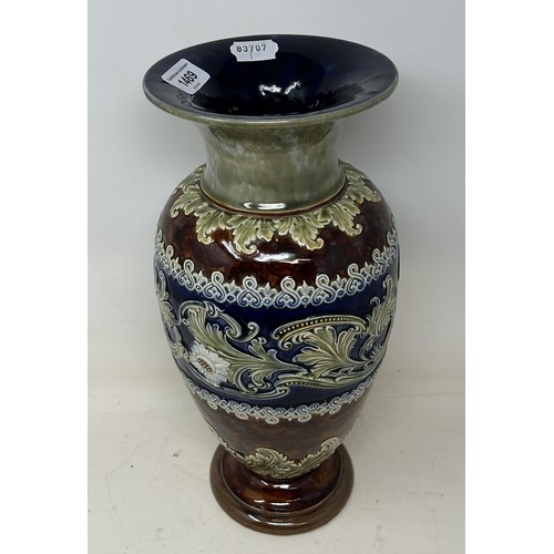 1469 - A Doulton Lambeth vase, decorated flowers, 35 cm high