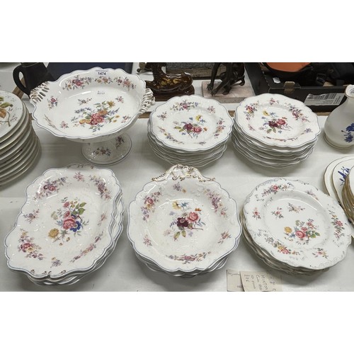 1474 - An early 20th century Staffordshire part service, comprising a comport, seven dishes and twenty  pla... 