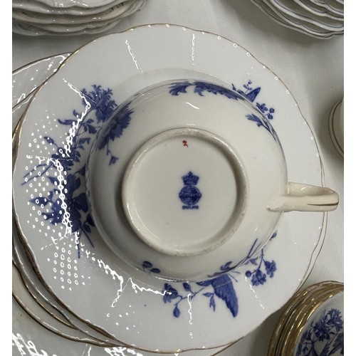 1522 - A Minton part blue and white service, comprising a jug, sugar bowl, eight cups, six saucers, and fif... 