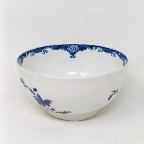 1571 - An early Worcester blue and white tea bowl, decorated flowers, crescent moon mark to base, 12 cm dia... 