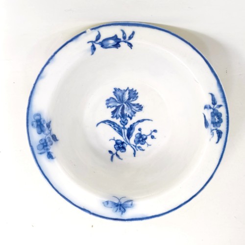 1572 - An 18th century porcelain blue and white bowl, decorated flowers, W mark to base, 10 cm diameter