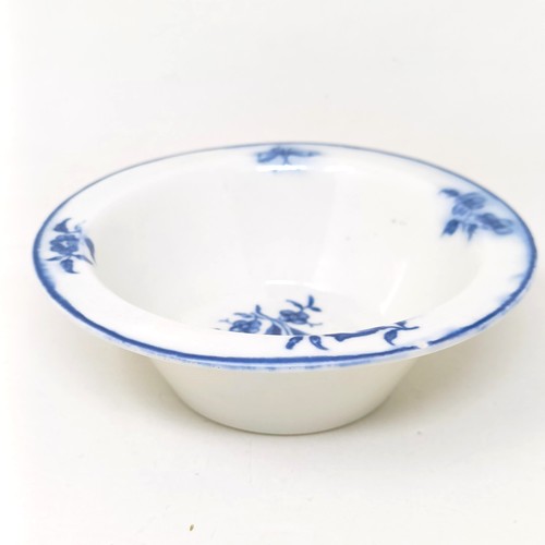 1572 - An 18th century porcelain blue and white bowl, decorated flowers, W mark to base, 10 cm diameter