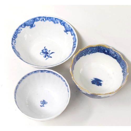 1561 - An 18th/19th century blue and white tea bowl, decorated flowers, diameter 7 cm, and two others (3)