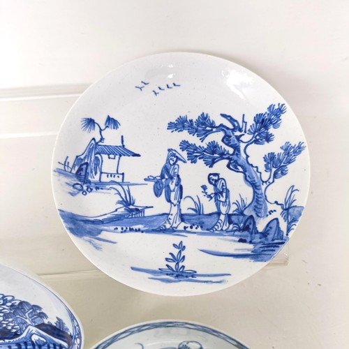 1564 - An early Worcester transfer printed blue and white tea bowl, decorated in the Chinese manner, cresce... 