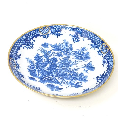 1567 - An early Worcester transfer printed blue and white dish, decorated in  theChinese manner, crescent m... 