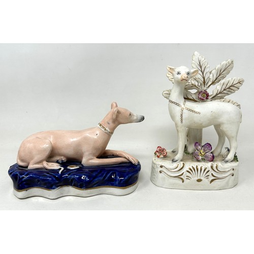 1524 - A 19th century Staffordshire quill holder, in the form of a greyhound, 14 cm wide, and a Staffordshi... 