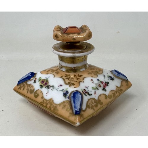 1534 - A 19th century Continental inkwell, the peach ground decorated flowers, 10 cm wide