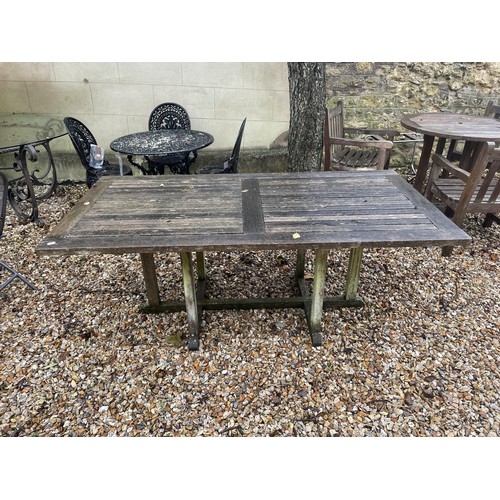 1744 - A garden table, 180 cm wide, weathered