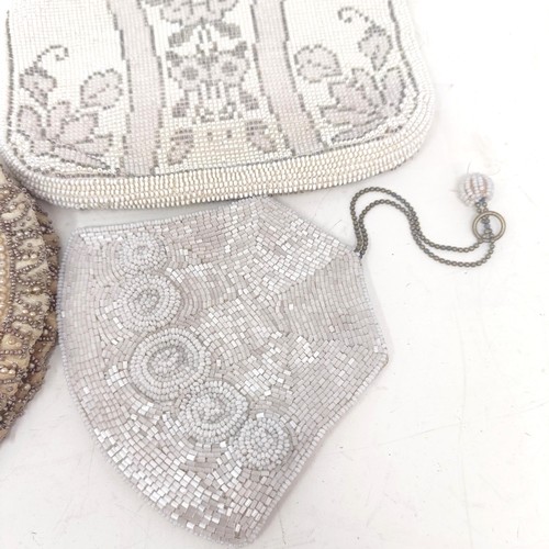 1431 - A 1920s beadwork handbag, another, and a purse (3)