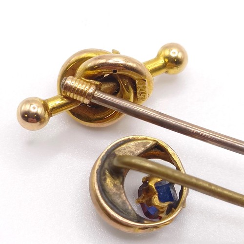 967 - A yellow metal and opal stick pin, and another (2)