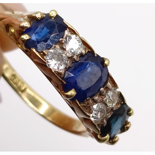 951 - An 18ct gold, sapphire and diamond ring, ring size Q