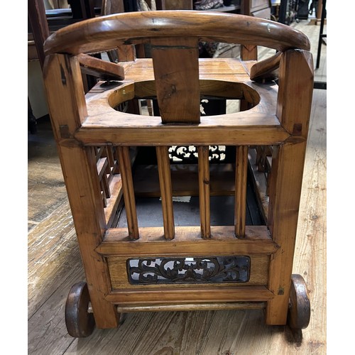 1670A - A Chinese hardwood pram, 60 cm wide