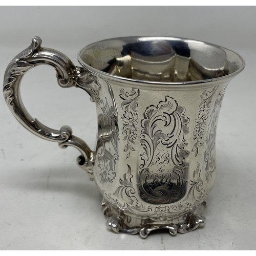 695 - A Victorian silver mug, of waisted form with engraved decoration London 1846, 4.7 ozt