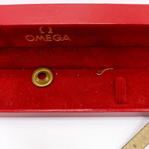 619 - A ladies Omega De Ville wristwatch, on a leather strap with a box