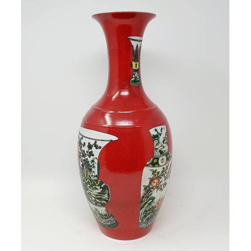 814 - A Chinese red ground vase, decorated vases, six character mark to base, 43 cm high, a Chinese print ... 