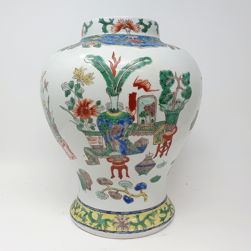 815 - A Chinese famille verte vase, of inverted baluster form, lacking cover, 34 cm high