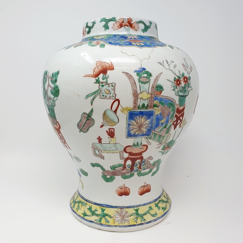 815 - A Chinese famille verte vase, of inverted baluster form, lacking cover, 34 cm high