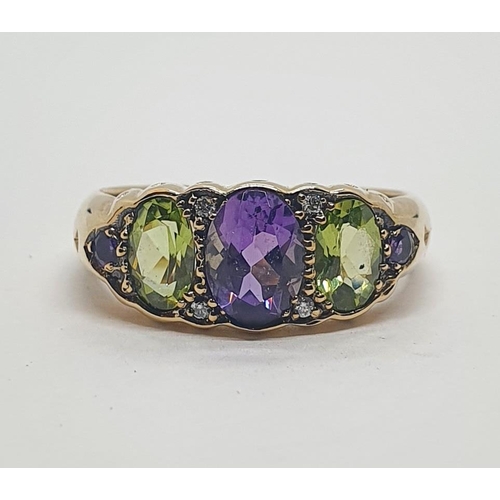 541 - A 9ct gold, amethyst, peridot and diamond ring, ring size N